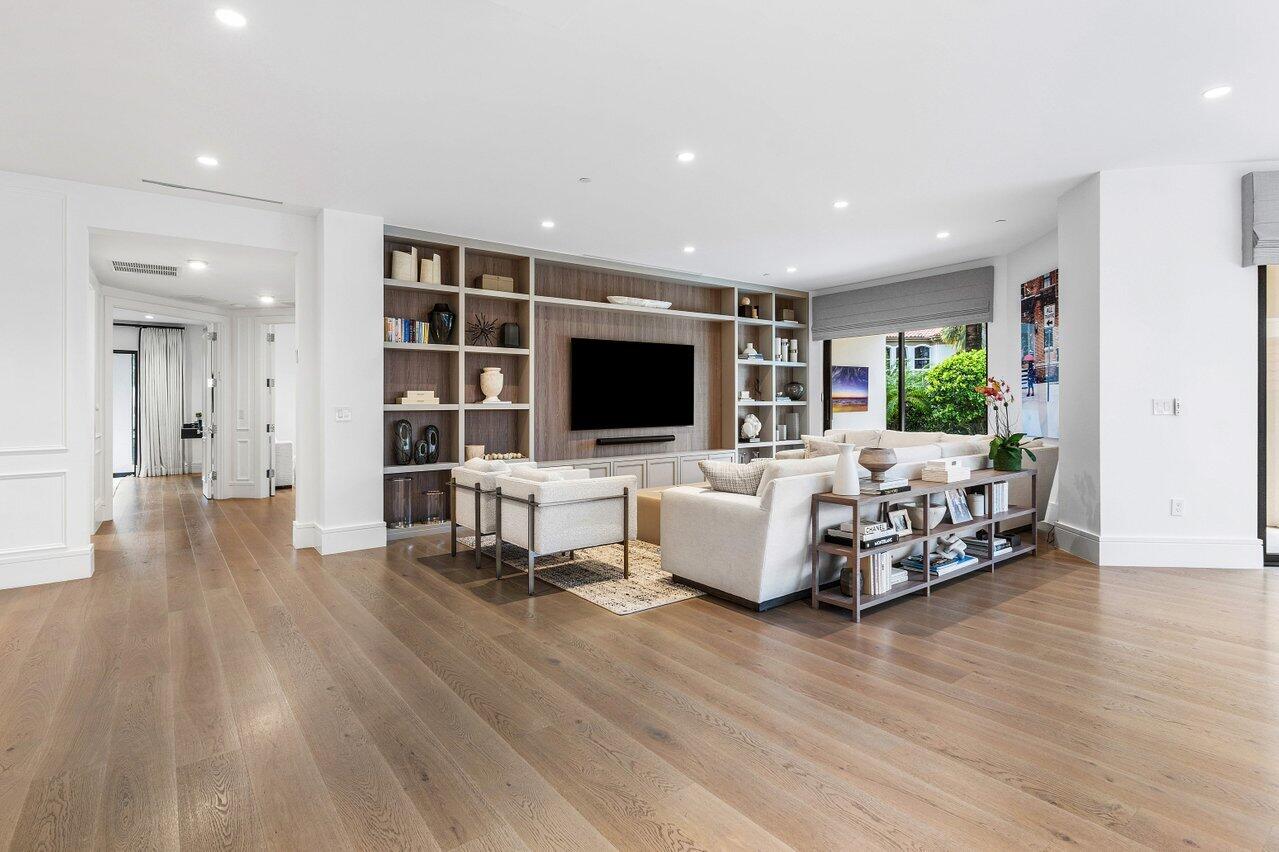 7383 Orangewood Lane, Unit 501 Boca Raton, FL 33433 - Photo 17 of 67 a living room with furniture and a flat screen tv