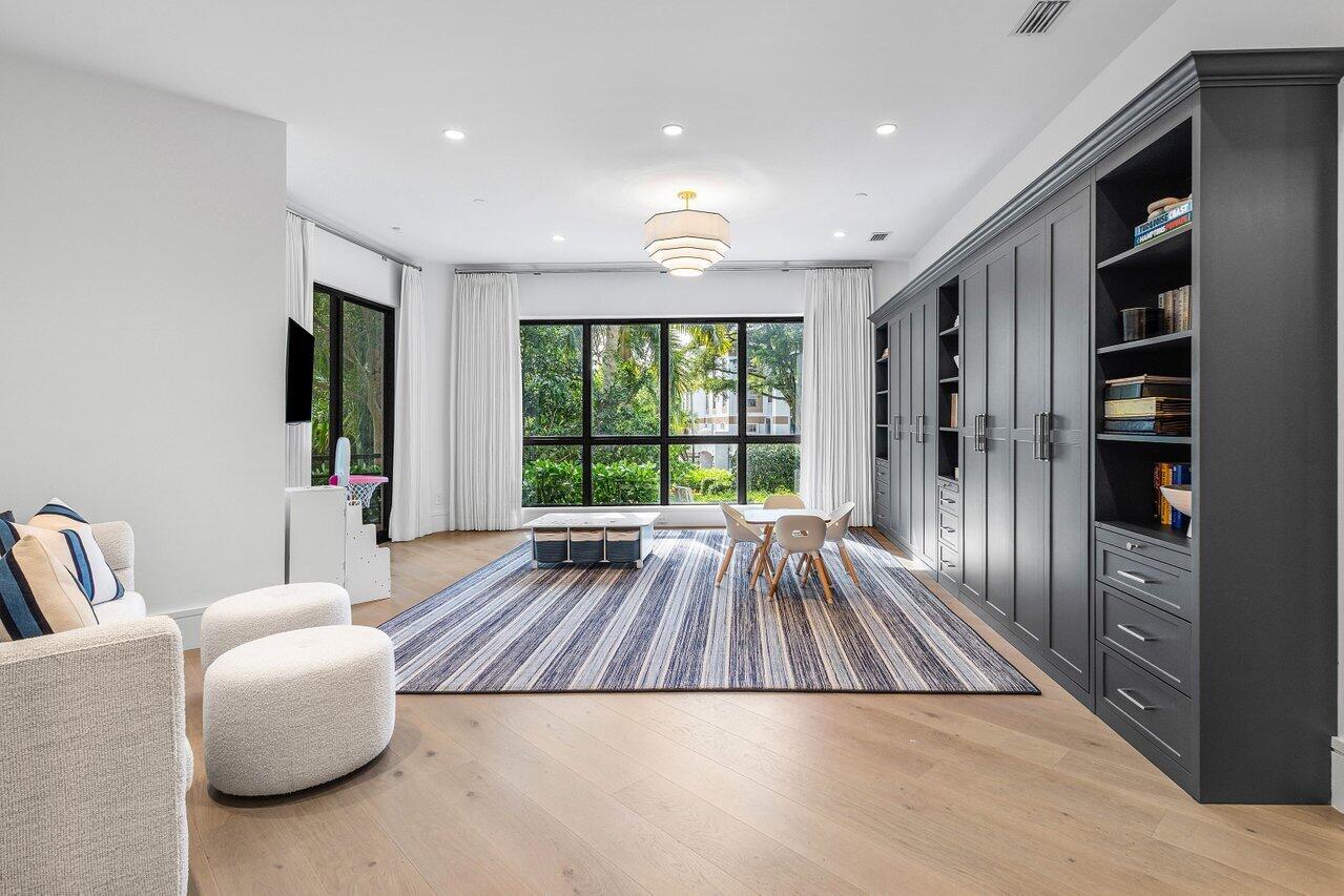 7383 Orangewood Lane, Unit 501 Boca Raton, FL 33433 - Photo 37 of 67 a living room with furniture and a large window