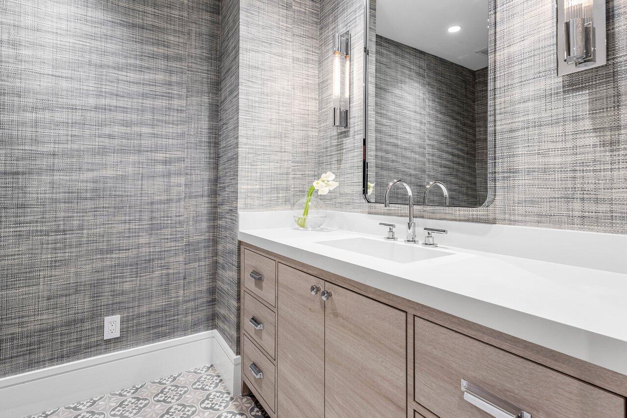 7383 Orangewood Lane, Unit 501 Boca Raton, FL 33433 - Photo 40 of 67 a bathroom with a sink and a bathtub