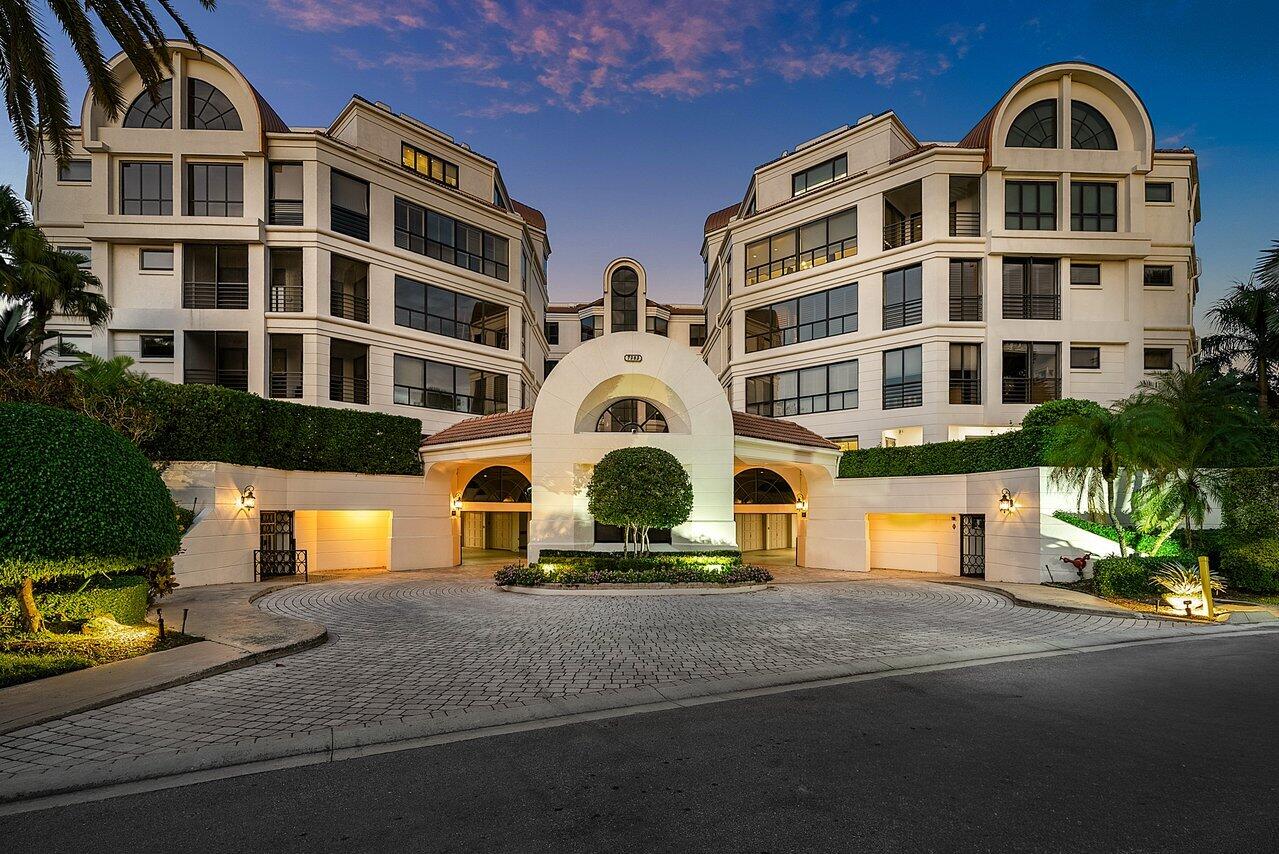 7383 Orangewood Lane, Unit 501 Boca Raton, FL 33433 - Photo 54 of 67 a front view of a building with large windows