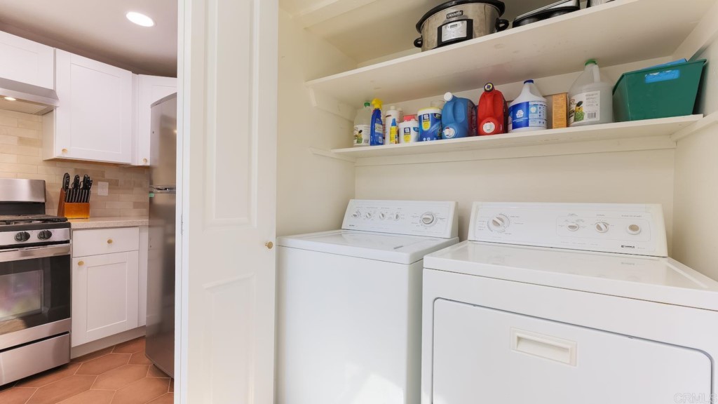 322 Ivy Lane Fallbrook, CA 92028 - Photo 15 of 35 a view of storage and utility room with washer and dryer