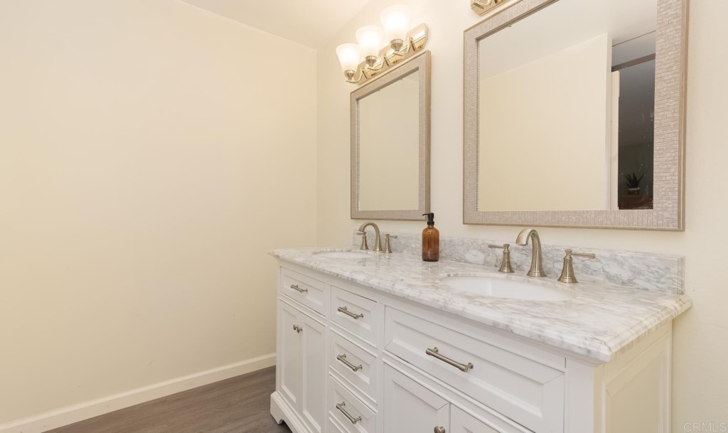 322 Ivy Lane Fallbrook, CA 92028 - Photo 20 of 35 a bathroom with a sink and a mirror