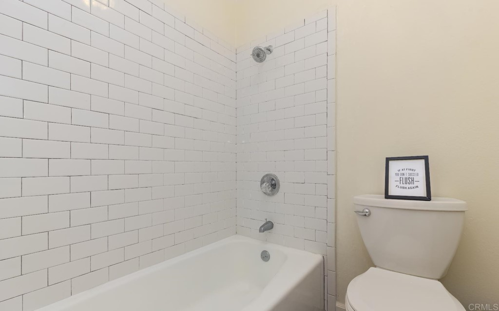 322 Ivy Lane Fallbrook, CA 92028 - Photo 22 of 35 a bathroom with a toilet and a shower