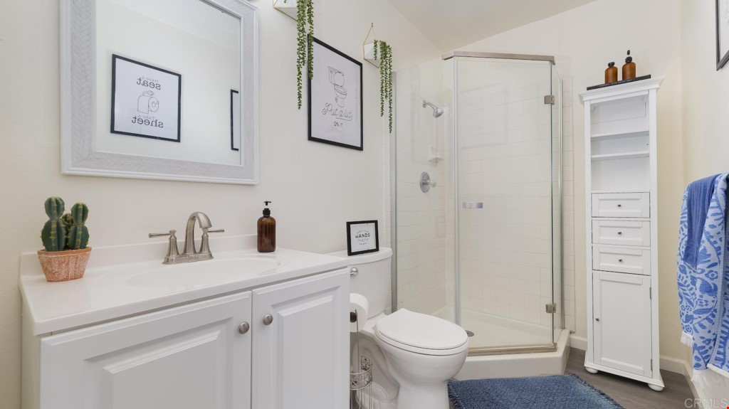 322 Ivy Lane Fallbrook, CA 92028 - Photo 24 of 35 a bathroom with a granite countertop sink toilet and shower