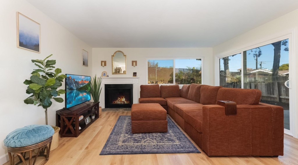 322 Ivy Lane Fallbrook, CA 92028 - Photo 7 of 35 a living room with furniture fireplace and window