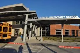 a view of a building with a street view
