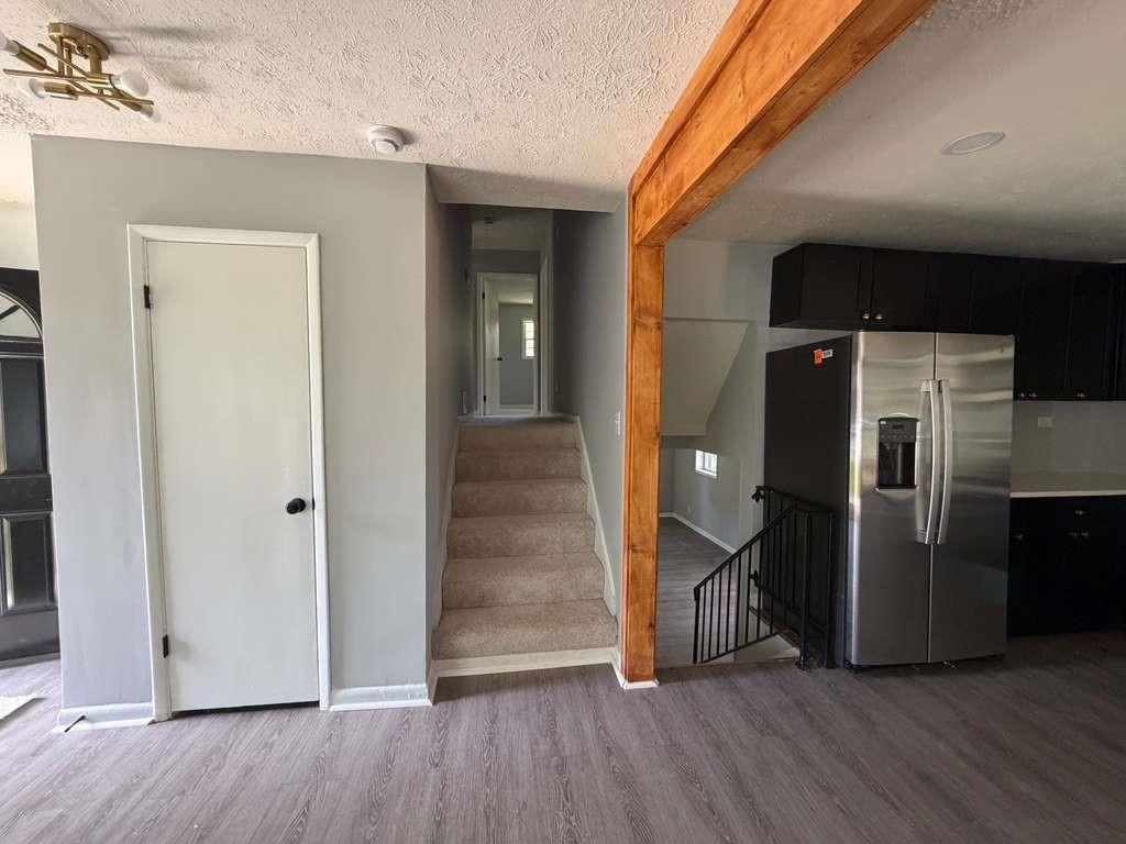 7367 Rountree Drive Riverdale, GA 30274 - Photo 15 of 18 a view of a kitchen with a refrigerator and wooden floor