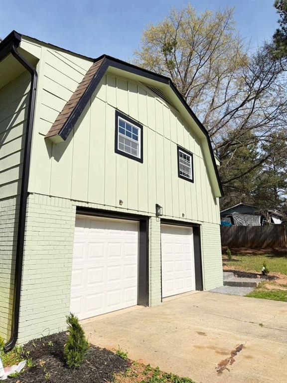 7367 Rountree Drive Riverdale, GA 30274 - Photo 3 of 18 a view of a house with a garage