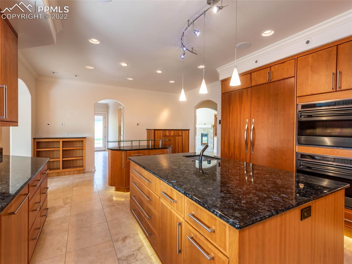 5 Alta Vista Road Colorado Springs, CO 80906 - Photo 15 of 49 Toe kick lighting throughout kitchen