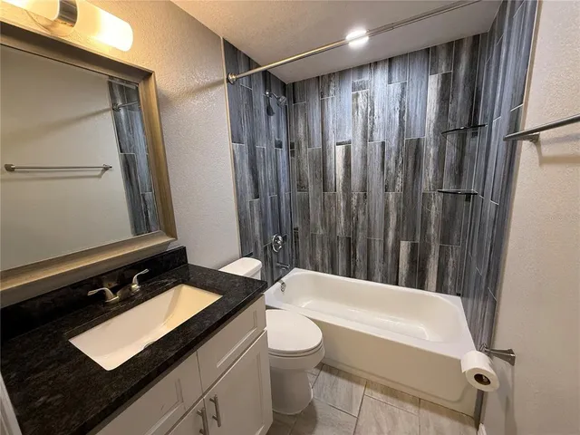 a view of empty room with windows