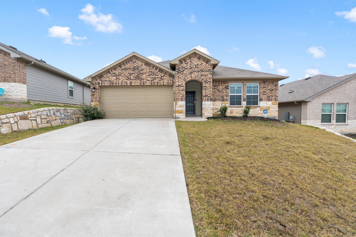 6021 Roderick Drive Austin, TX 78724 - Photo 1 of 1 a view of a house with a yard