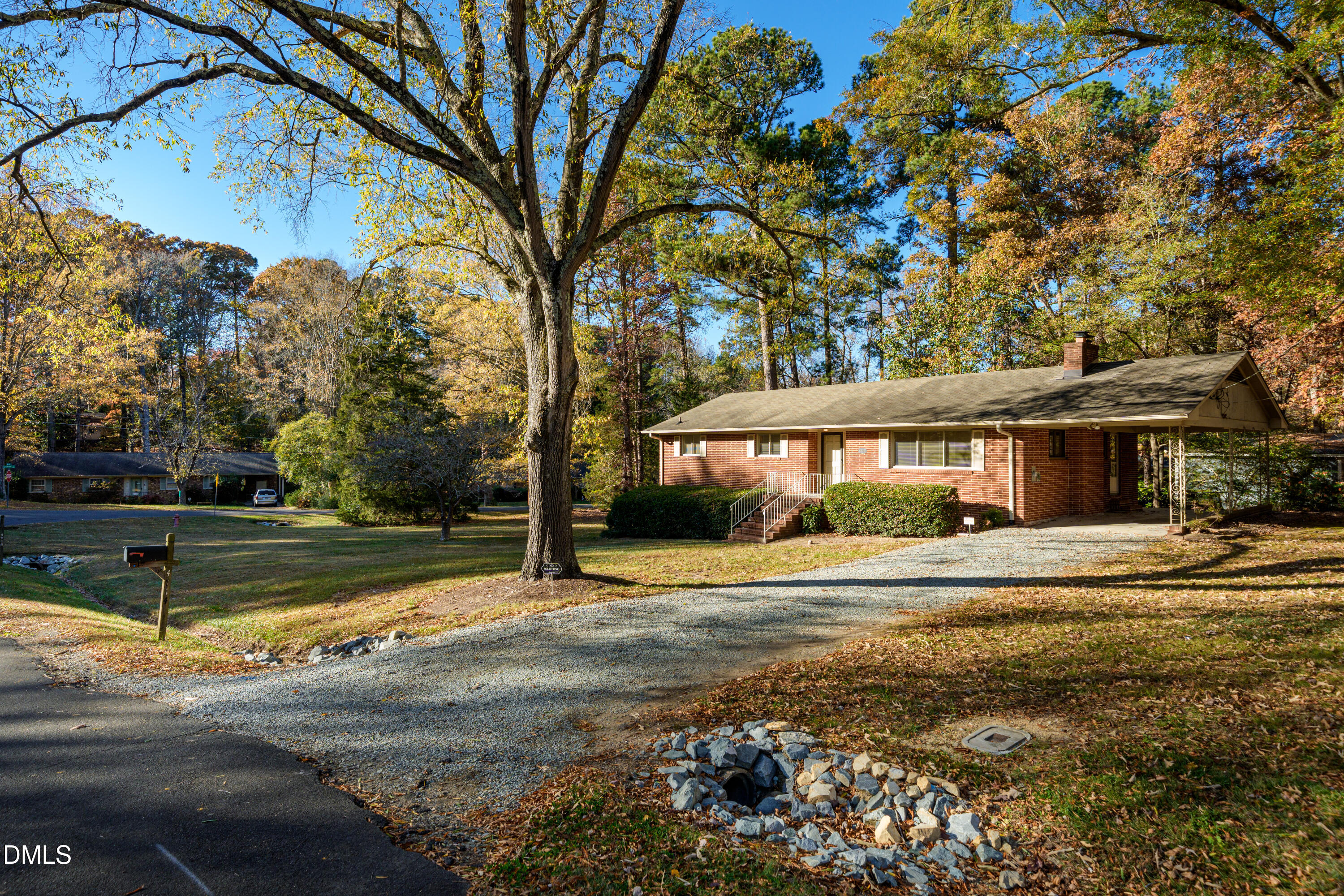 4714 West Hills Drive Durham, NC 27705 - Photo 2 of 27 a view of a house with a yard