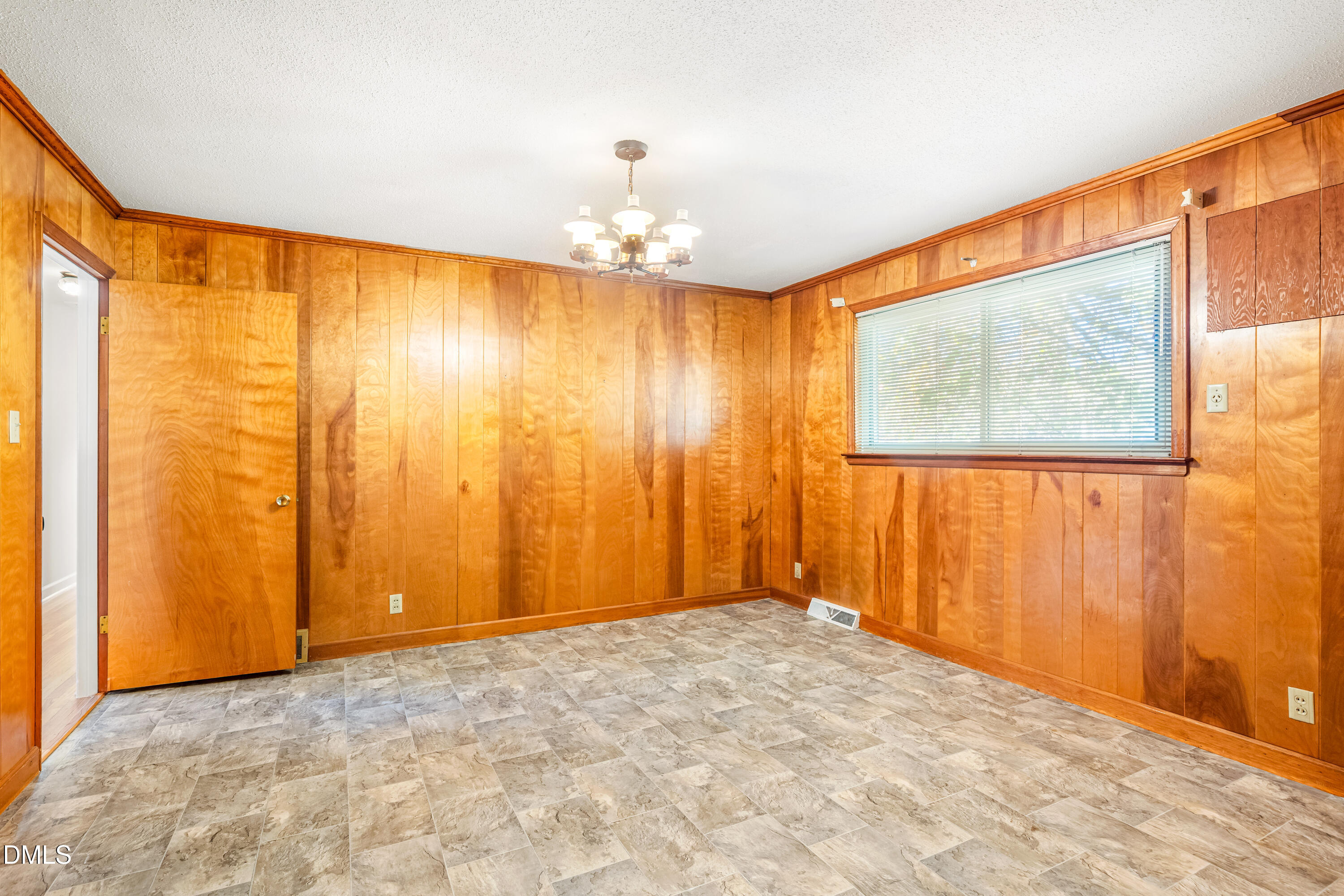 4714 West Hills Drive Durham, NC 27705 - Photo 8 of 27 a view of an empty room with a window