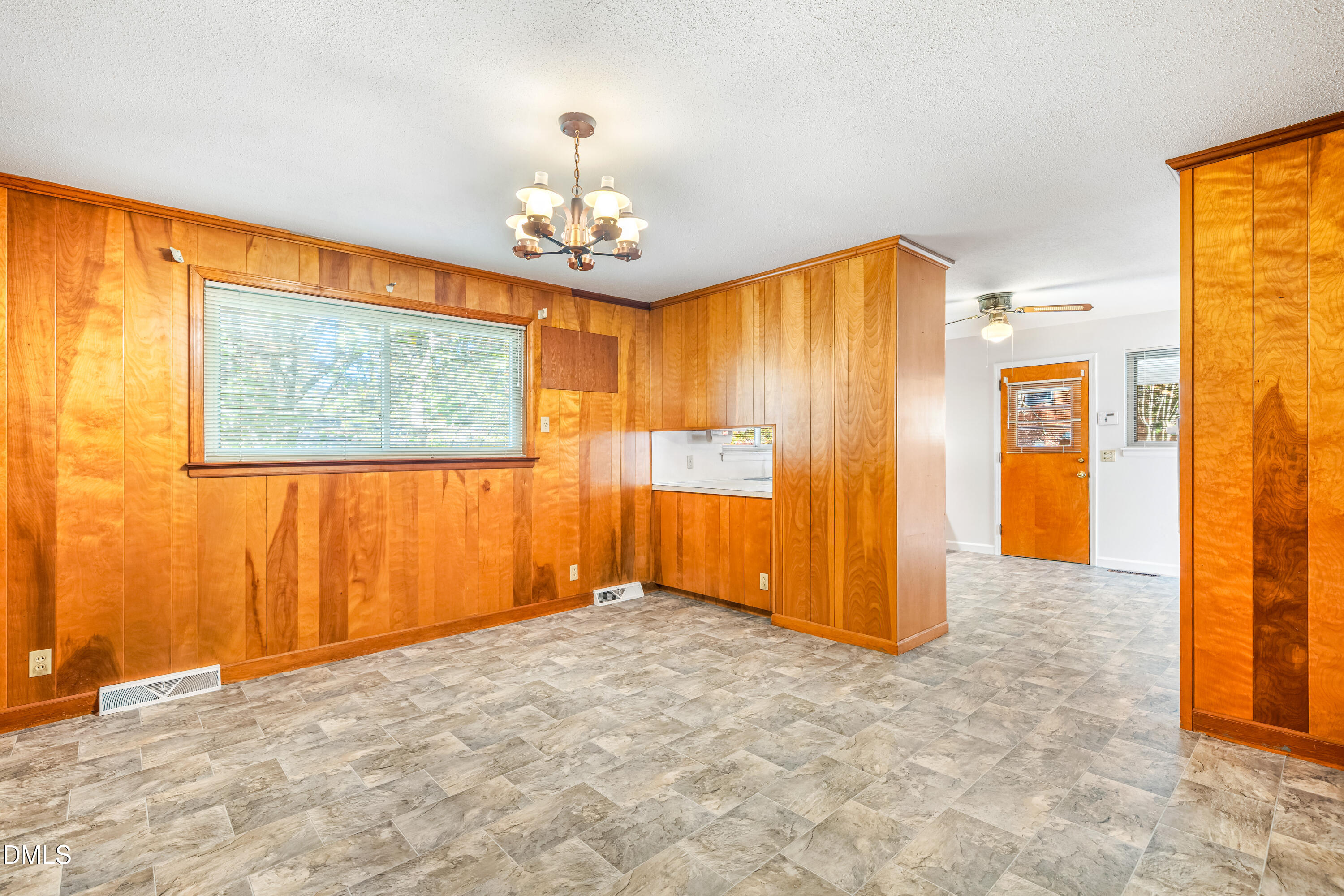 4714 West Hills Drive Durham, NC 27705 - Photo 9 of 27 a view of an empty room with a window