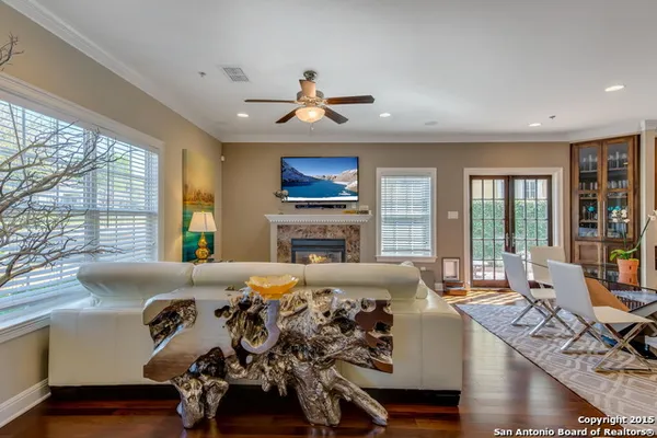 a bed room with a bed and a chandelier
