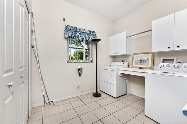 a swimming pool with a outdoor seating