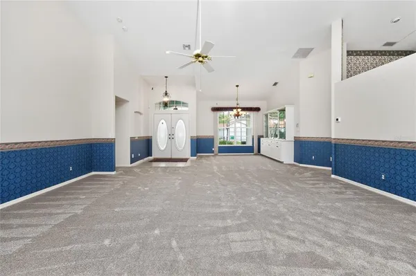 a view of a kitchen with a sink and cabinet area