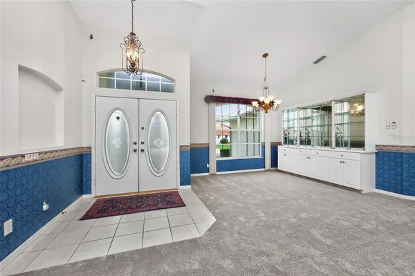 a view of a room with window and outdoor space