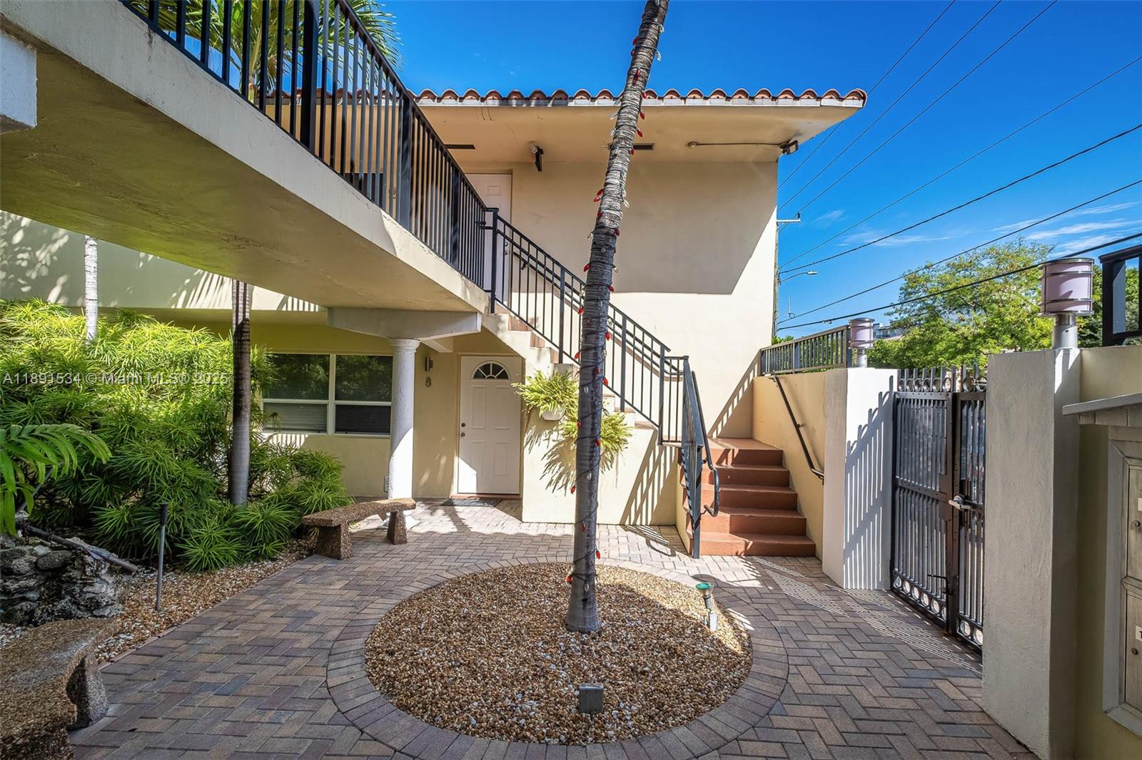 a view of a house with fountain