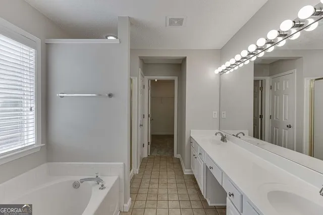 a bathroom with a bathtub