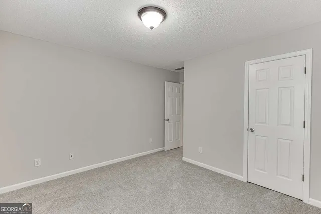 an empty room with closet