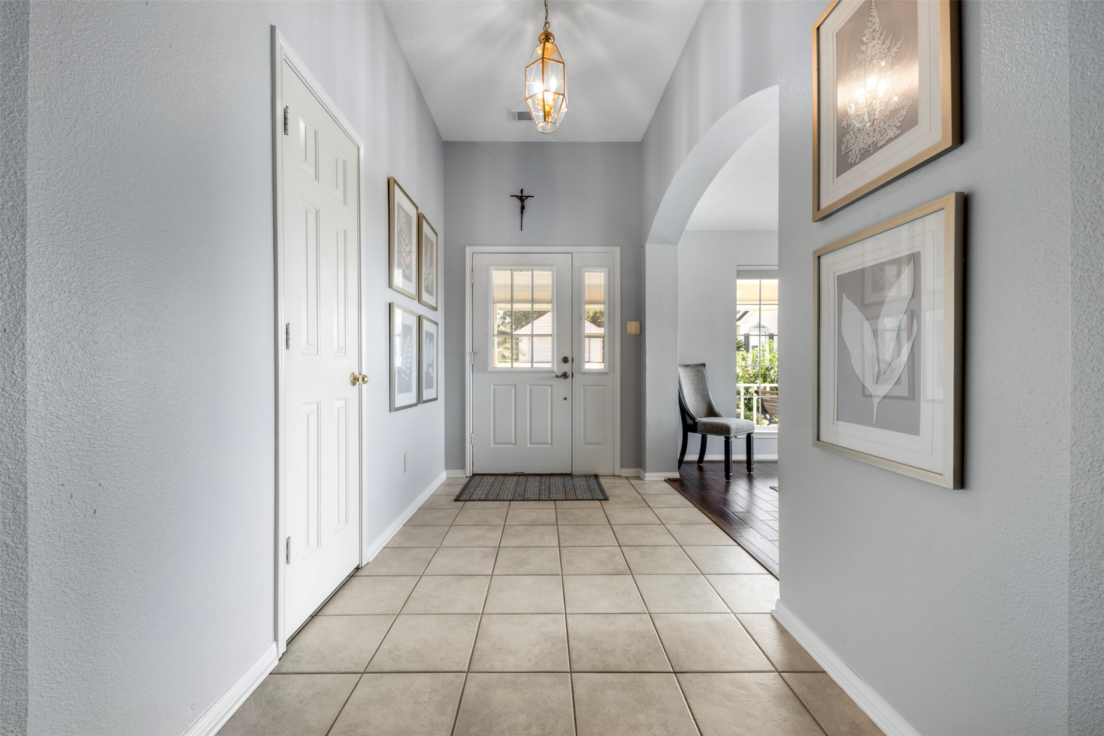 381 West Lake Drive Point Blank, TX 77364 - Photo 3 of 33 Welcome guests in style through this light-filled foyer creating a warm, inviting first impression.