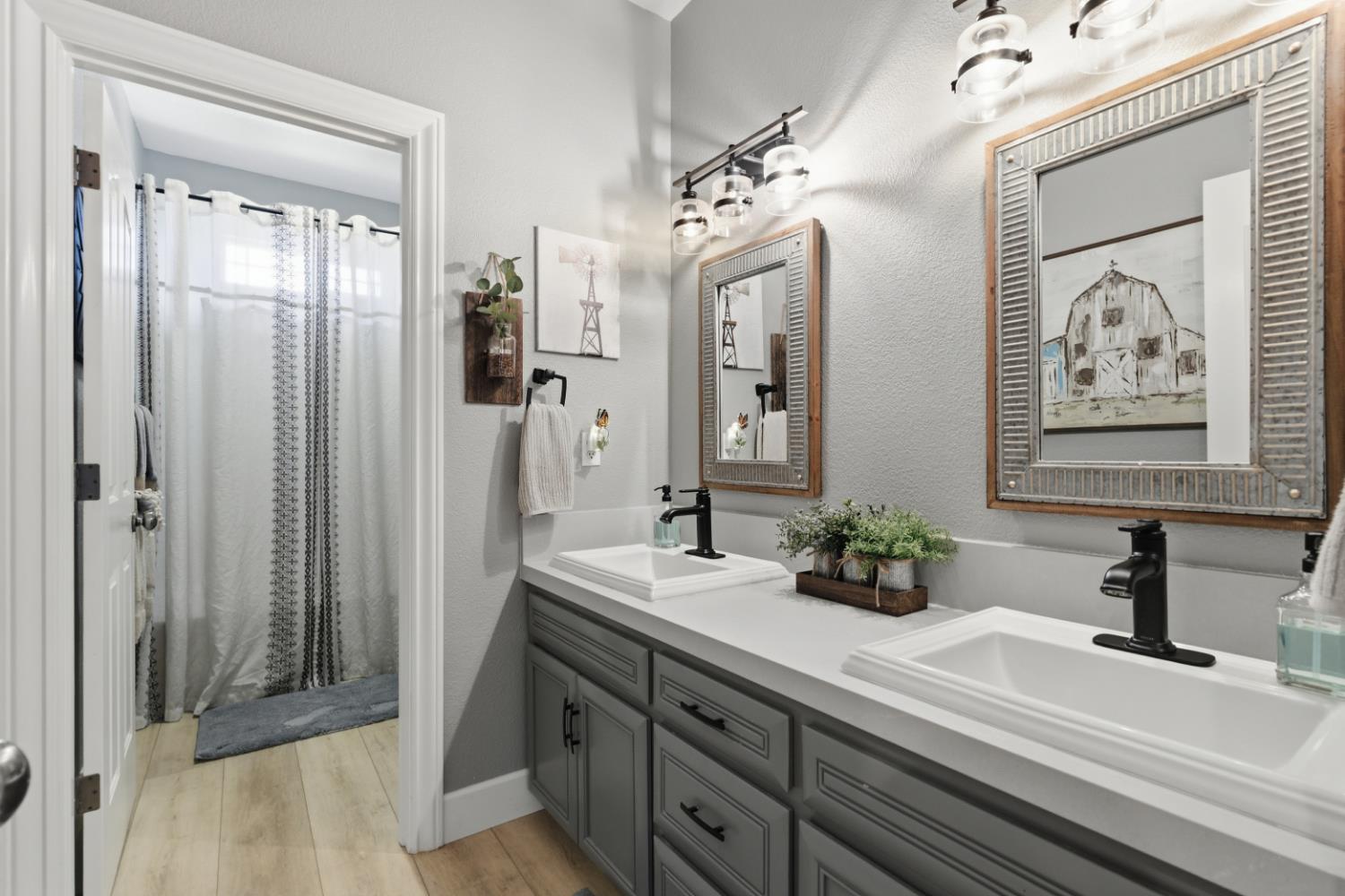 3302 Bear River Drive Rio Oso, CA 95674 - Photo 20 of 93 a bathroom with a double vanity sink mirror and shower