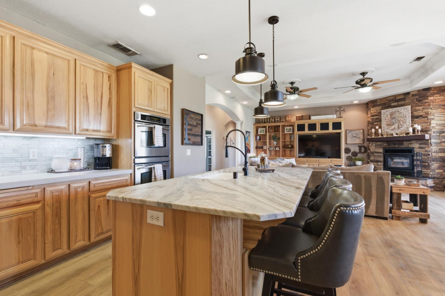 3302 Bear River Drive Rio Oso, CA 95674 - Photo 24 of 93 a large kitchen with stainless steel appliances granite countertop a sink a stove and a refrigerator