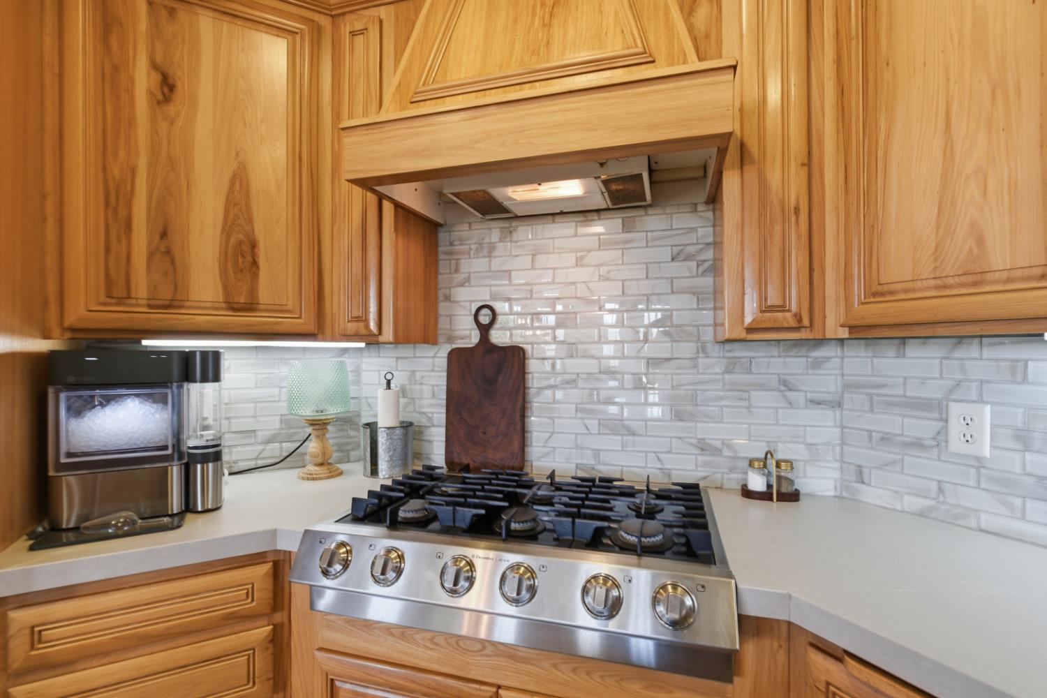 3302 Bear River Drive Rio Oso, CA 95674 - Photo 26 of 93 a kitchen with granite countertop a stove and a sink