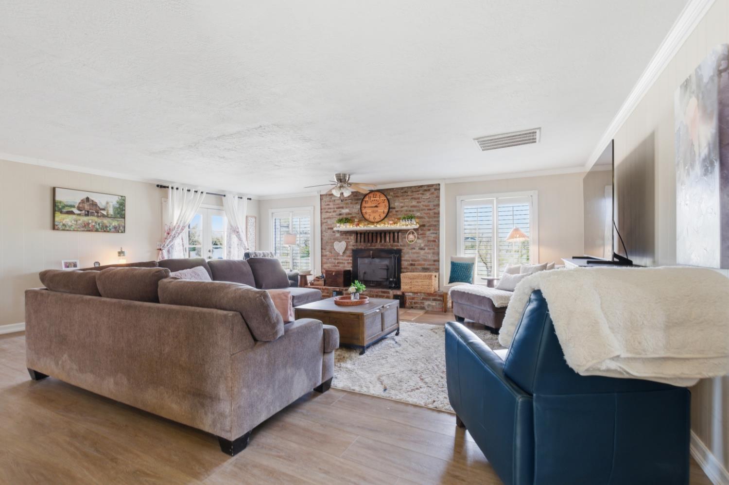 3302 Bear River Drive Rio Oso, CA 95674 - Photo 68 of 93 a living room with fireplace furniture and a wooden floor
