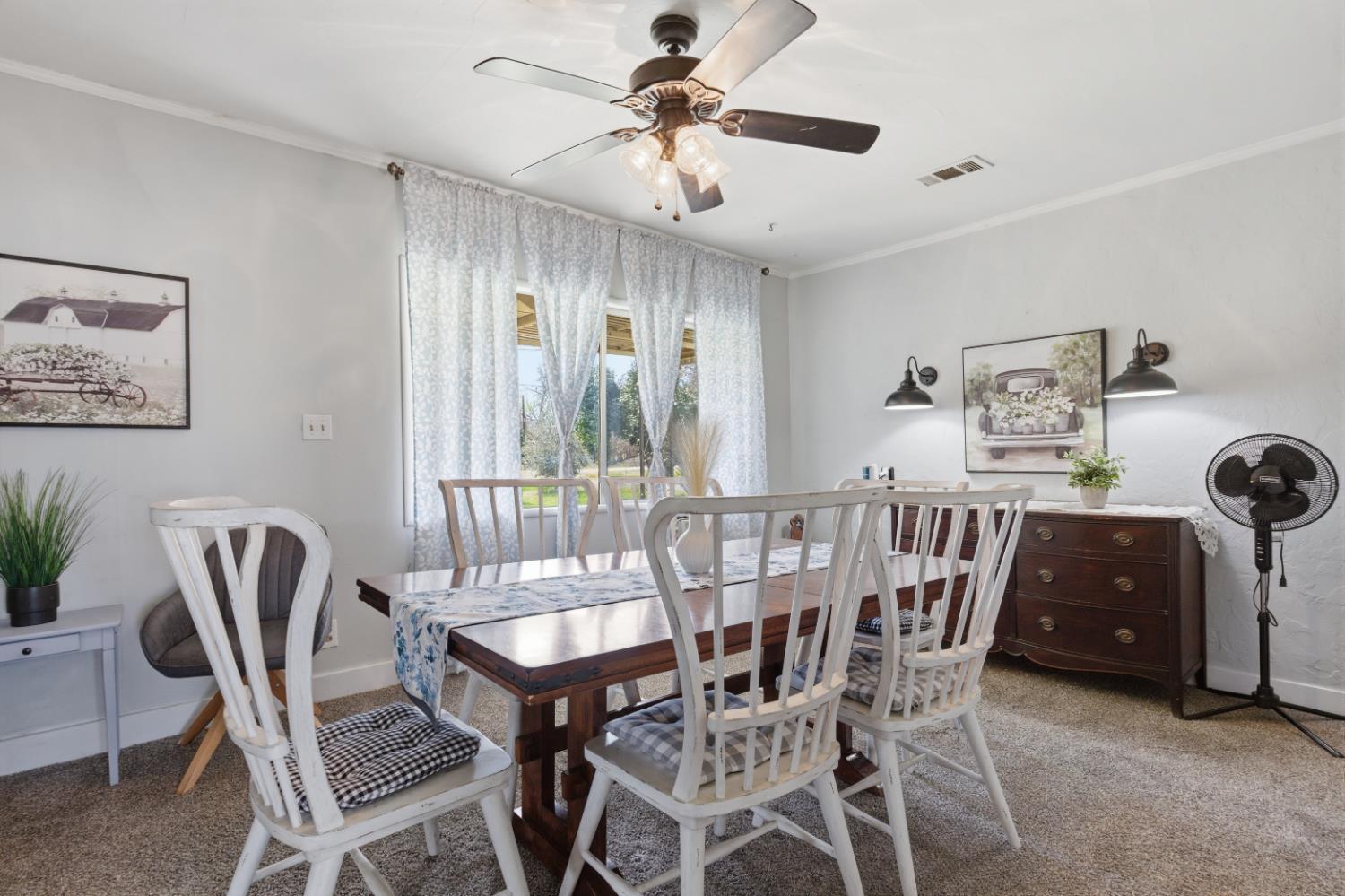 3302 Bear River Drive Rio Oso, CA 95674 - Photo 73 of 93 a view of a dining room with furniture and chandelier