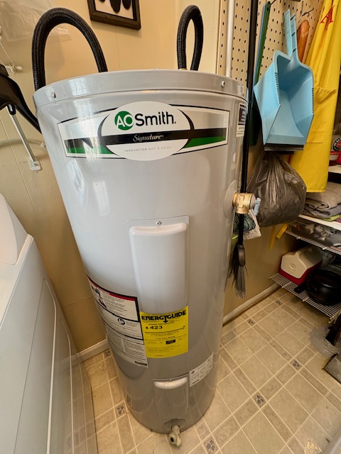 3079 Rocky Point Road Springfield, OH 45502 - Photo 21 of 37 Essential water heating unit, neatly maintained for comfort and convenience.
