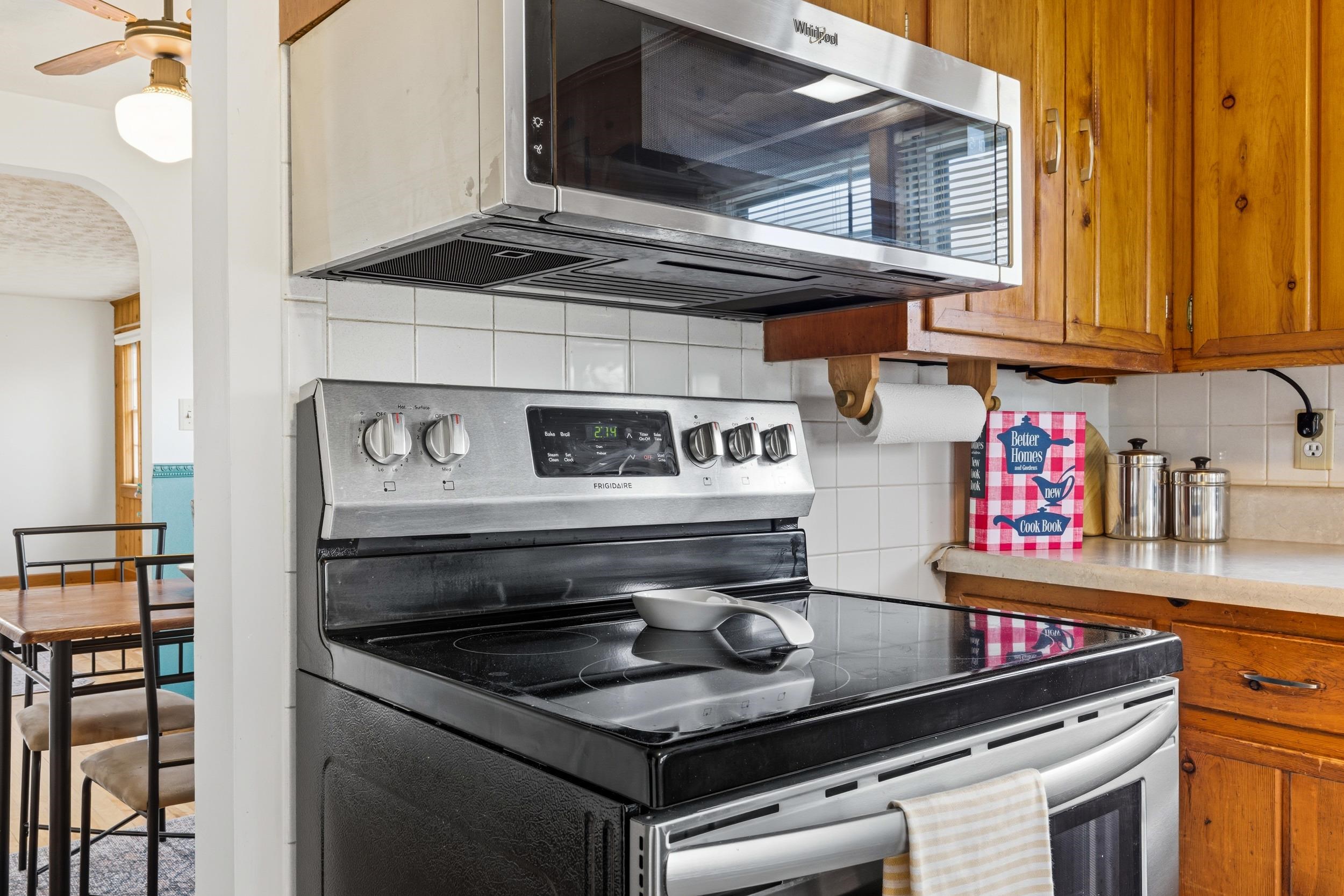 161 Boyers Road Harrisonburg, VA 22801 - Photo 11 of 74 a kitchen with stainless steel appliances granite countertop a stove and a sink