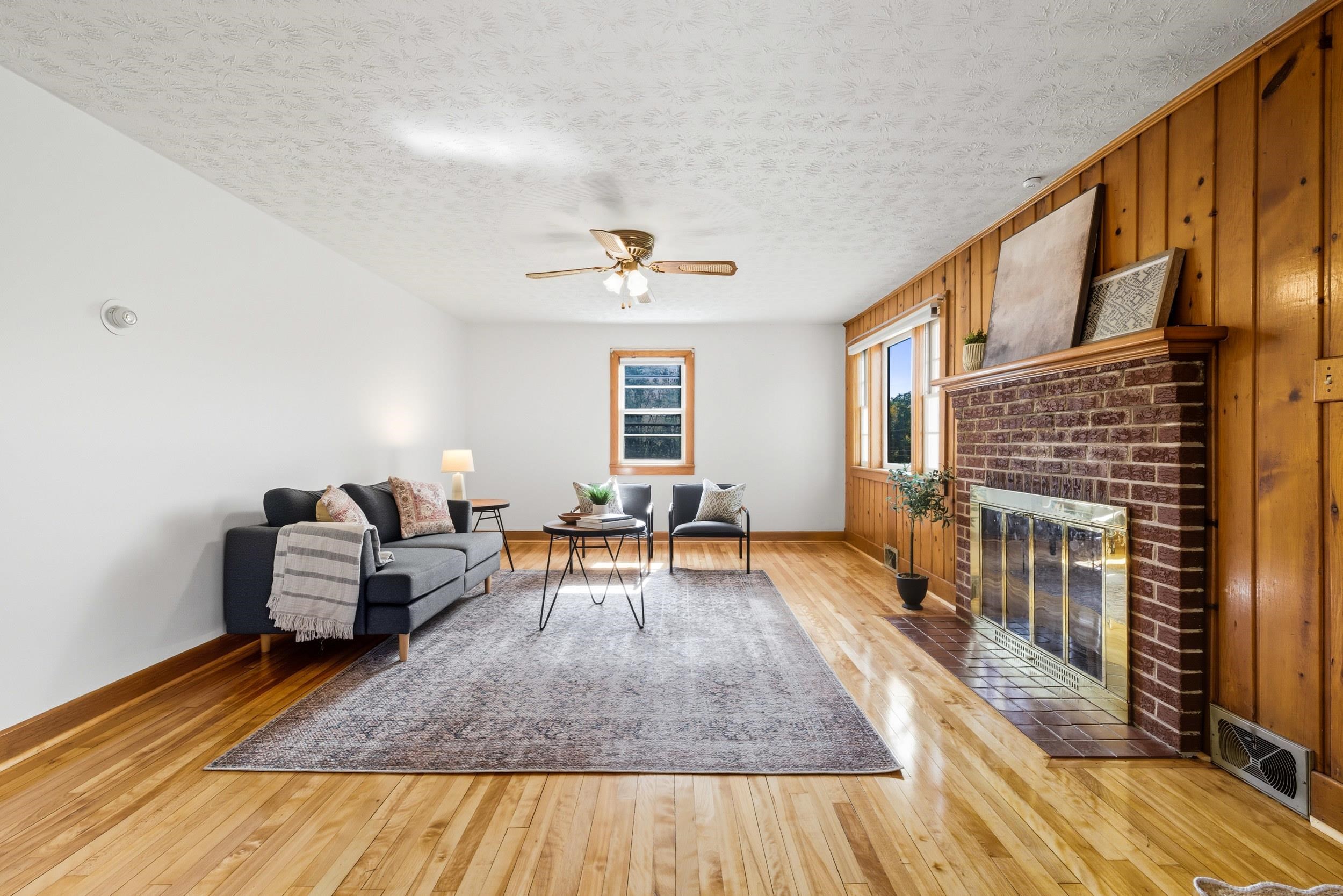 161 Boyers Road Harrisonburg, VA 22801 - Photo 17 of 74 a living room with furniture and a fireplace
