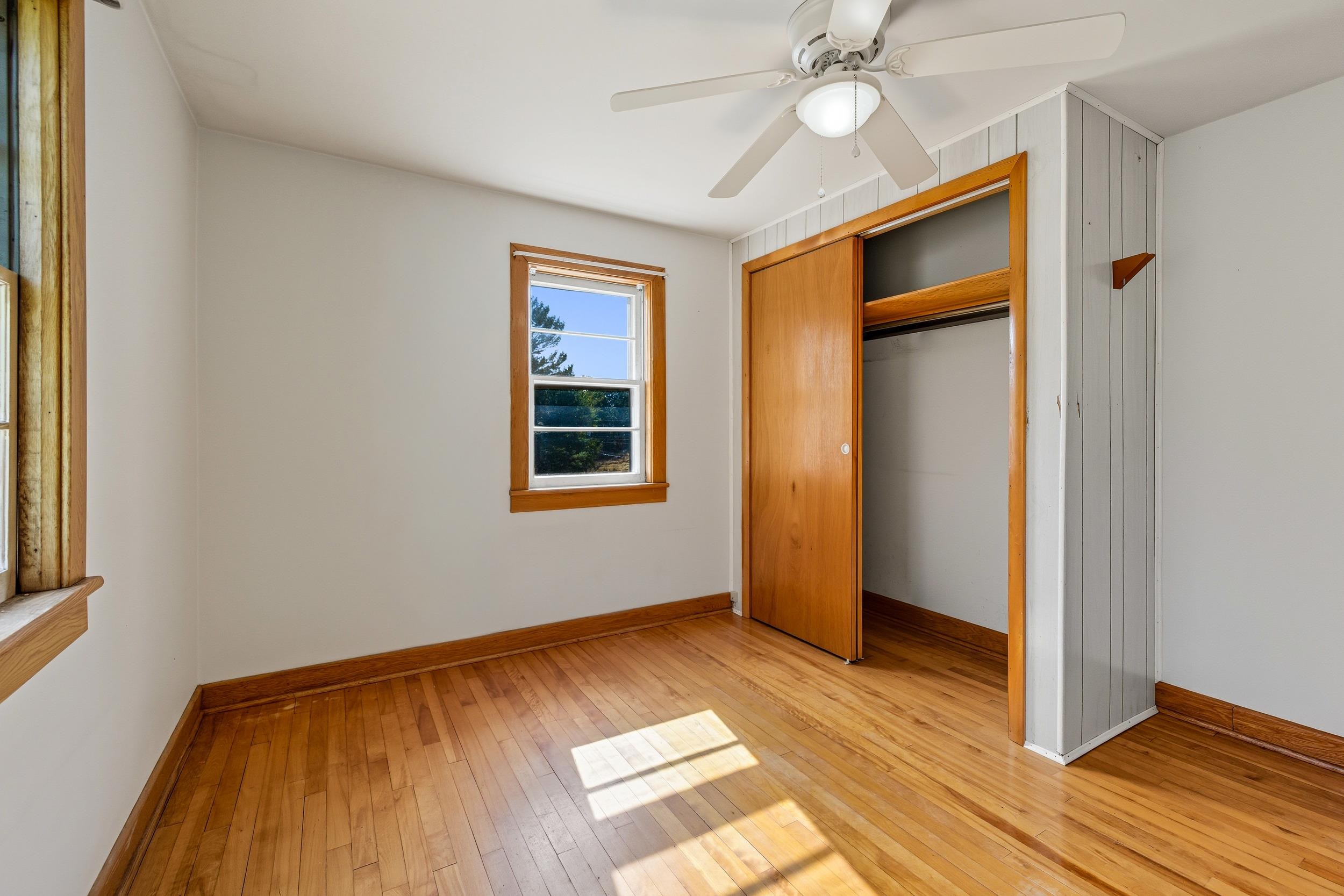 161 Boyers Road Harrisonburg, VA 22801 - Photo 27 of 74 a view of empty room with wooden floor and fan