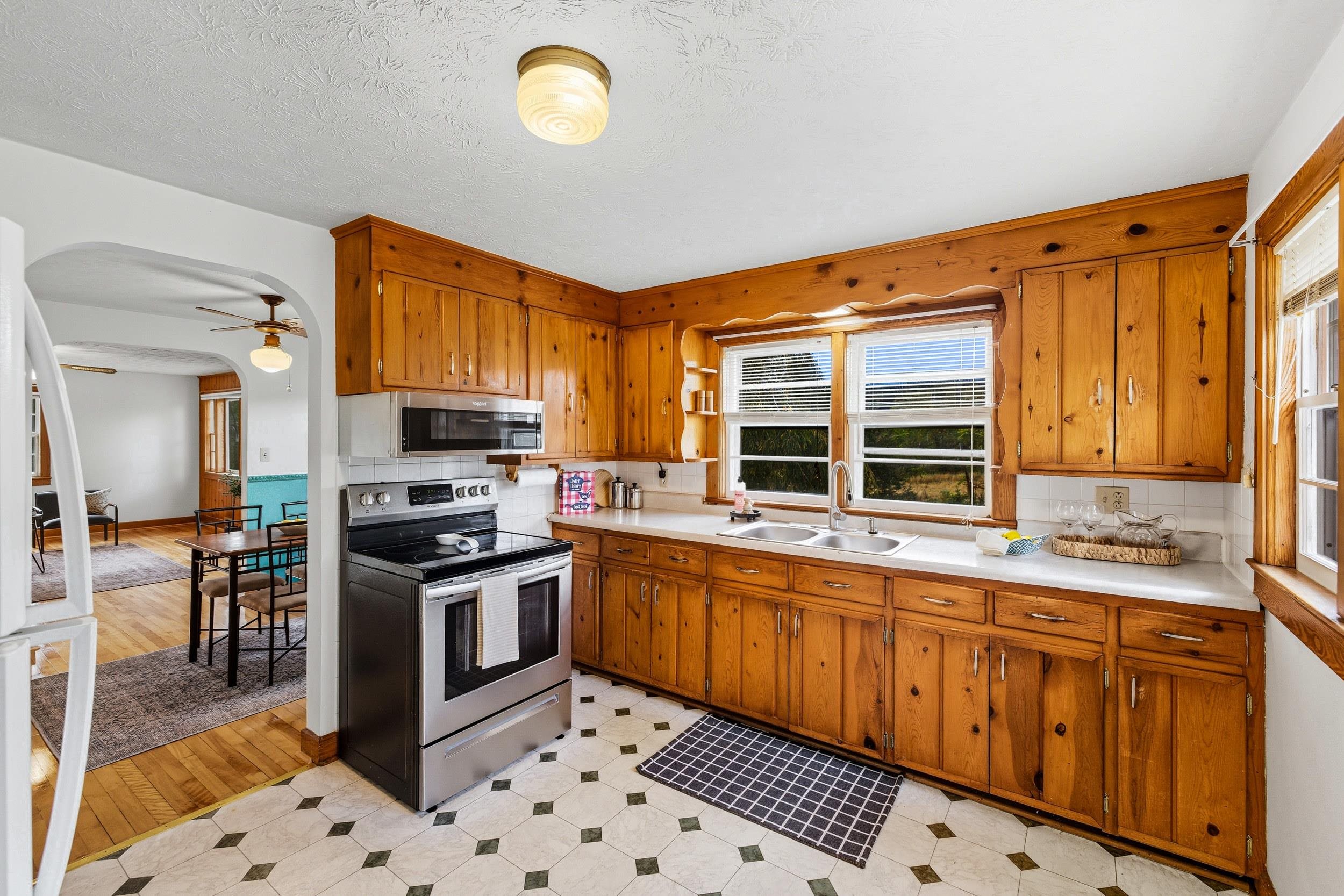 161 Boyers Road Harrisonburg, VA 22801 - Photo 3 of 74 a kitchen with stainless steel appliances a stove a sink a stove a refrigerator cabinets and dining table