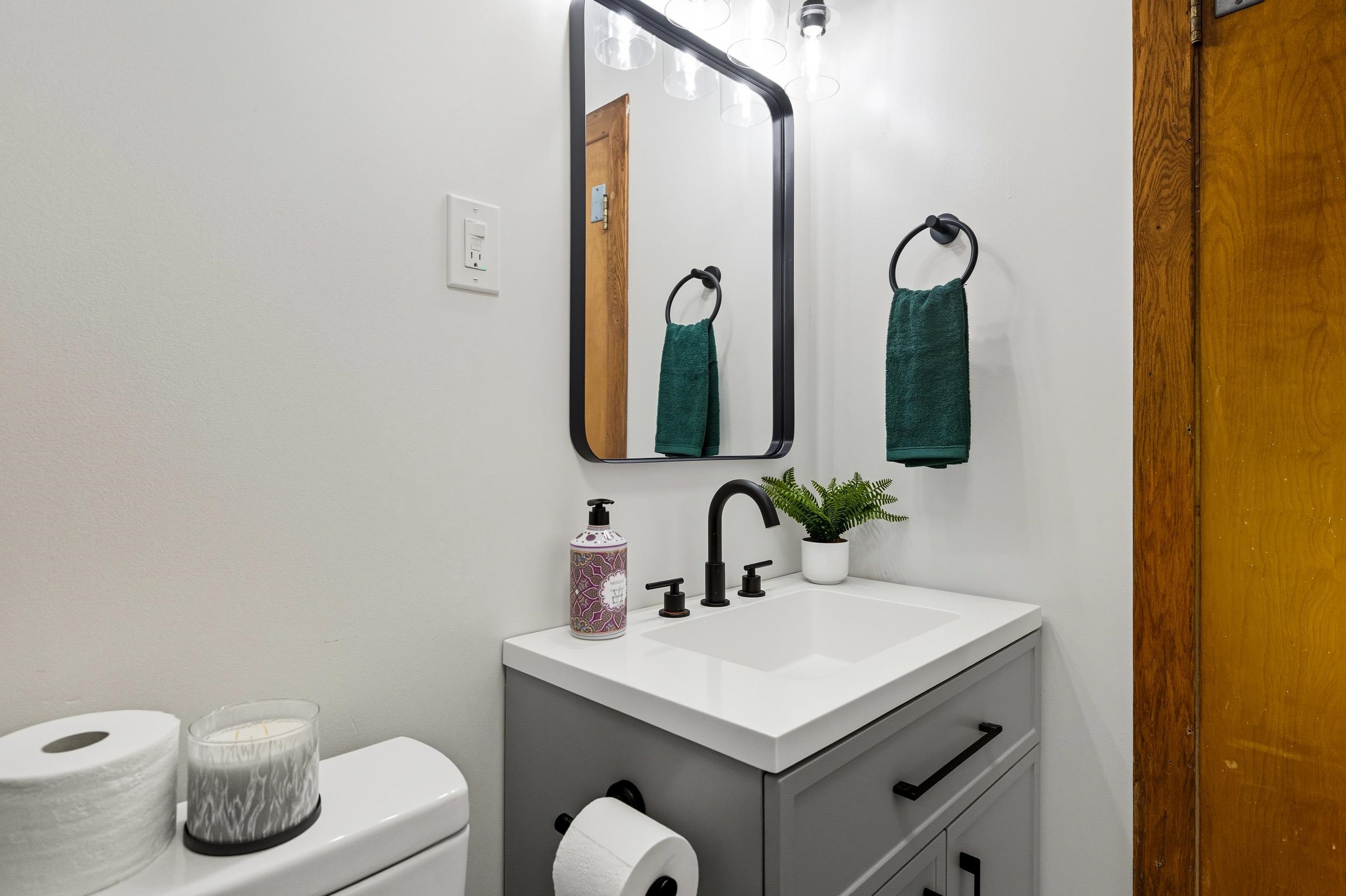 161 Boyers Road Harrisonburg, VA 22801 - Photo 35 of 74 a bathroom with a toilet sink and mirror