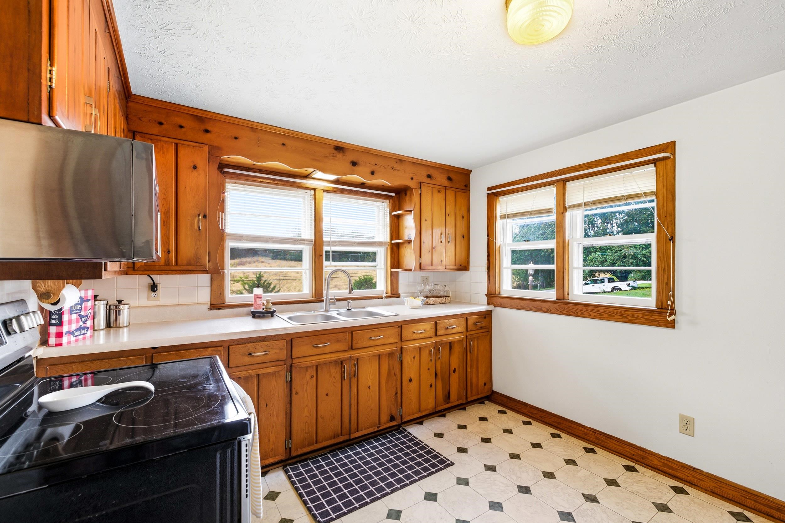 161 Boyers Road Harrisonburg, VA 22801 - Photo 4 of 74 a kitchen that has a sink and a stove in it