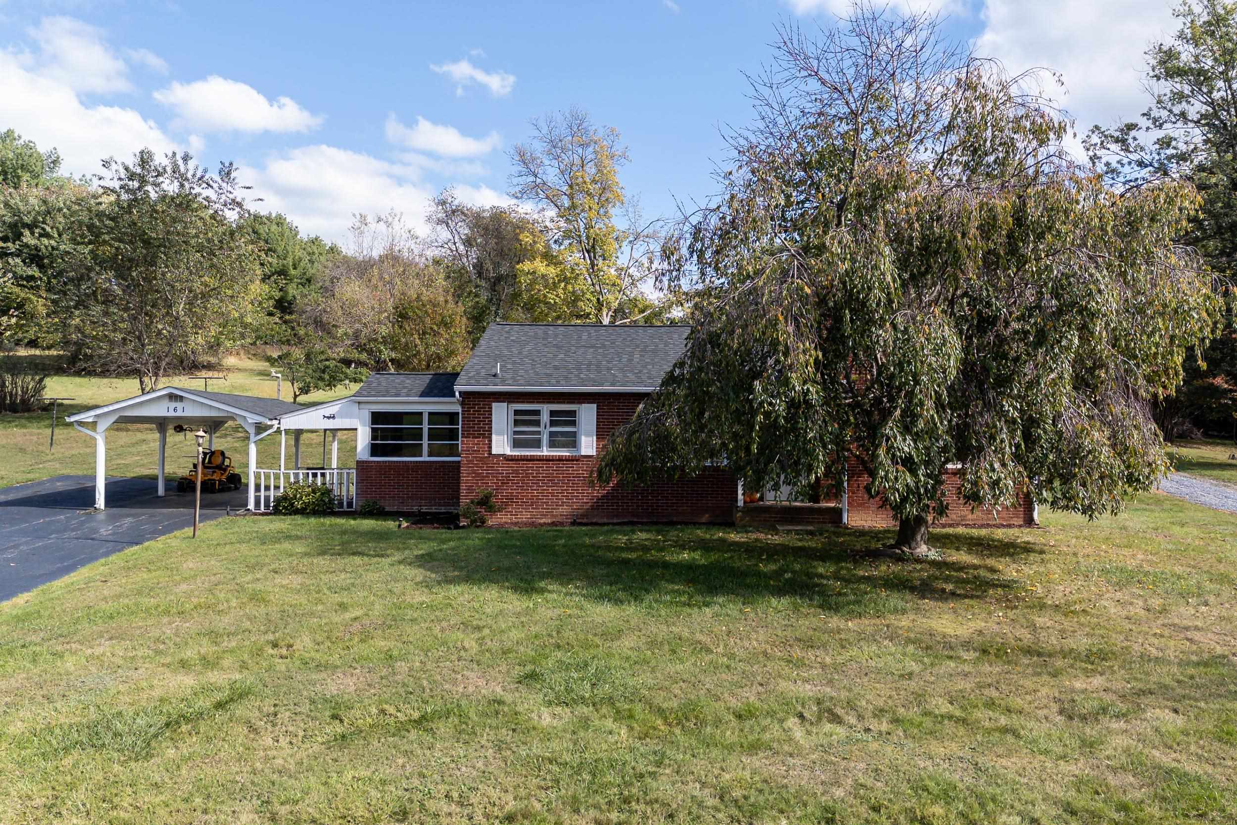 161 Boyers Road Harrisonburg, VA 22801 - Photo 47 of 74 a front view of a house with a garden