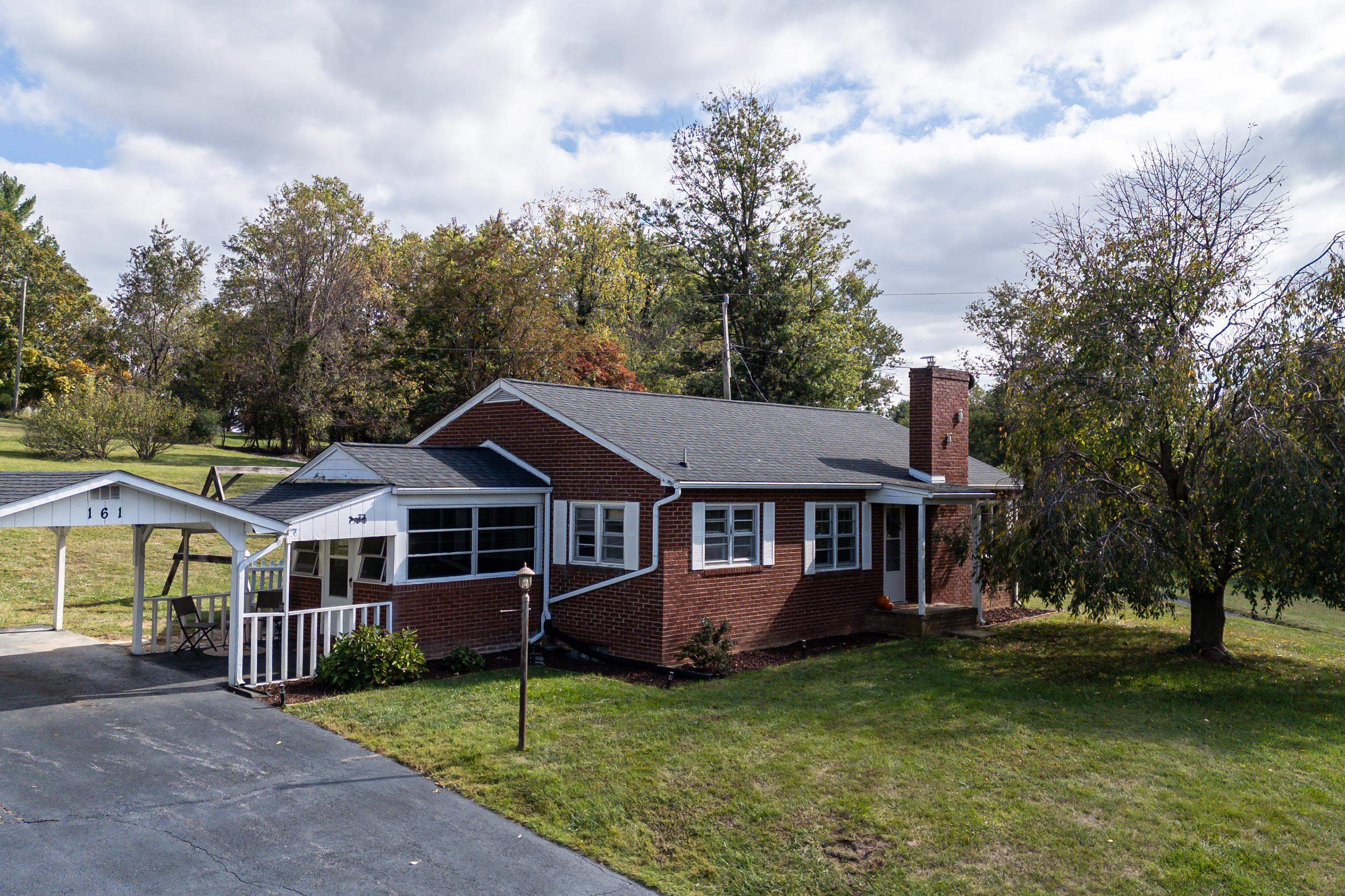 161 Boyers Road Harrisonburg, VA 22801 - Photo 48 of 74 a view of a house with a yard and large trees