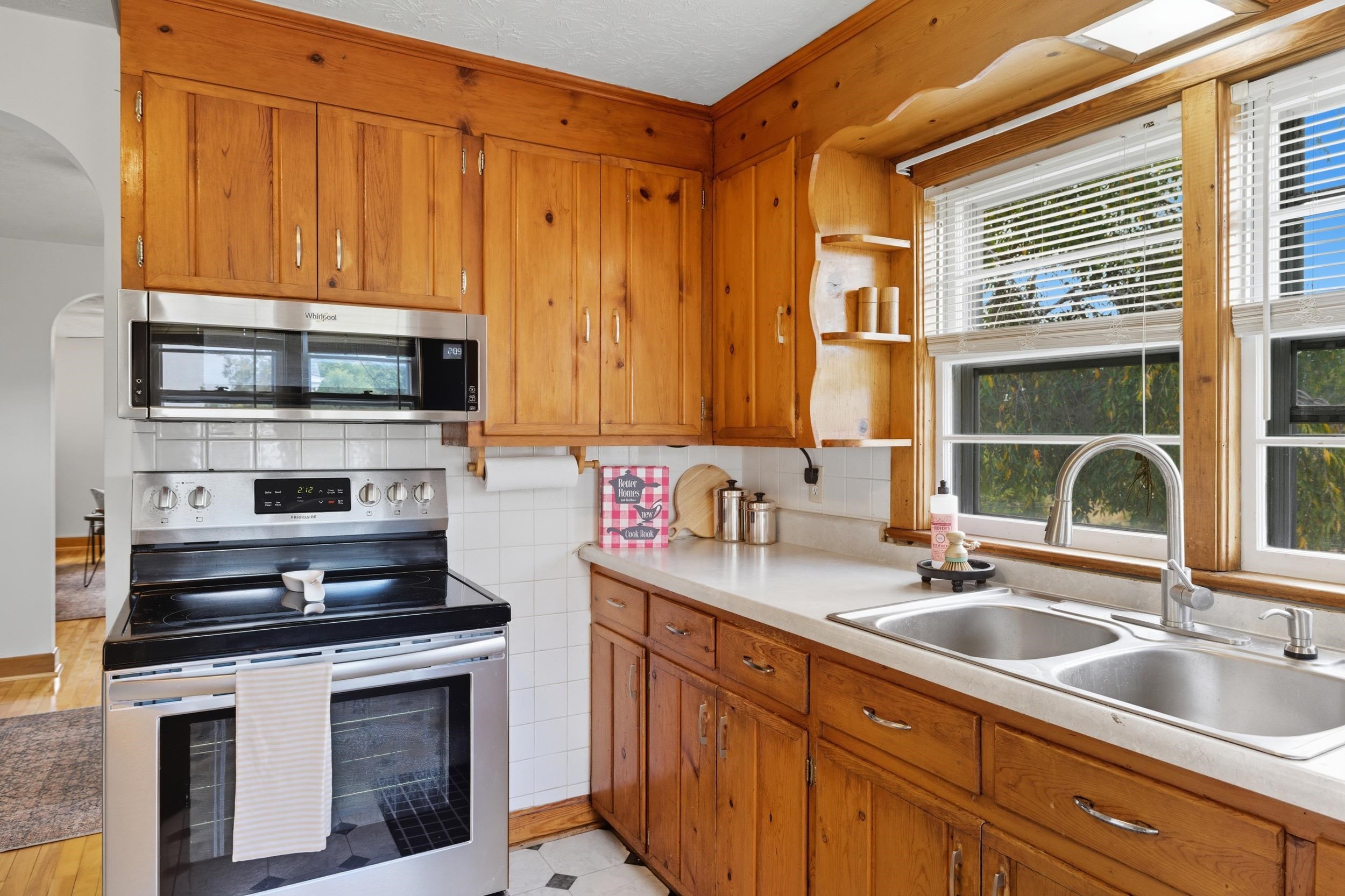161 Boyers Road Harrisonburg, VA 22801 - Photo 8 of 74 a kitchen with stainless steel appliances granite countertop a sink stove and microwave