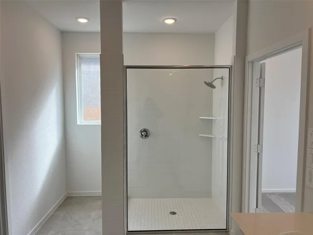 a view of a swimming pool with outdoor seating