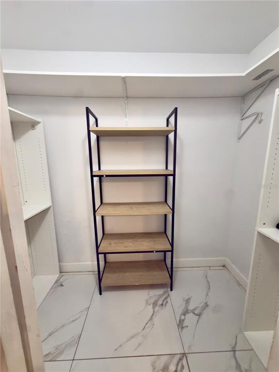 9989 Leahy Road Jacksonville, FL 32246 - Photo 11 of 21 a view of an empty walk in closet