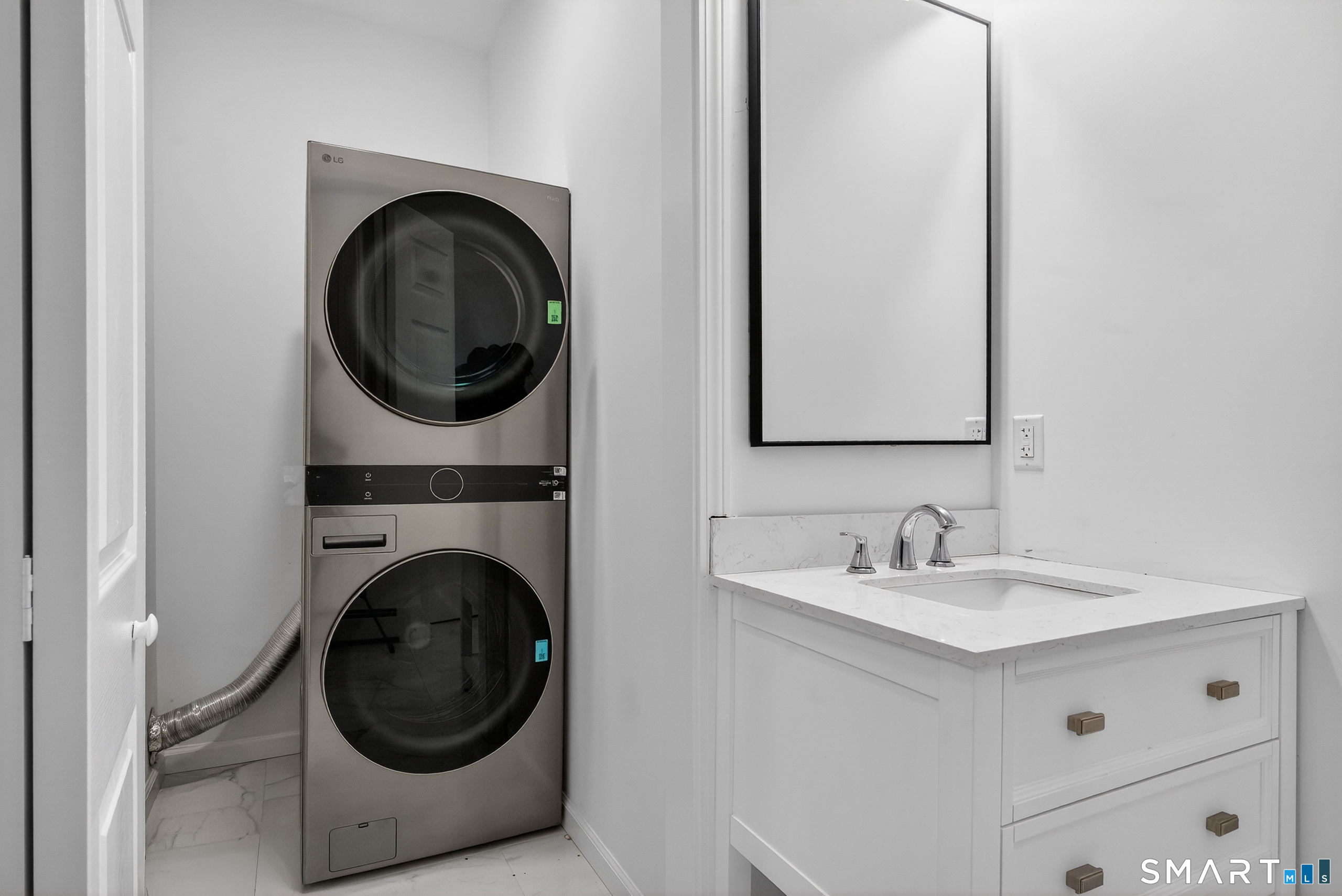 144 Cottage Street, Unit 2 Bridgeport, CT 06605 - Photo 10 of 12 a utility room with sink dryer and washer