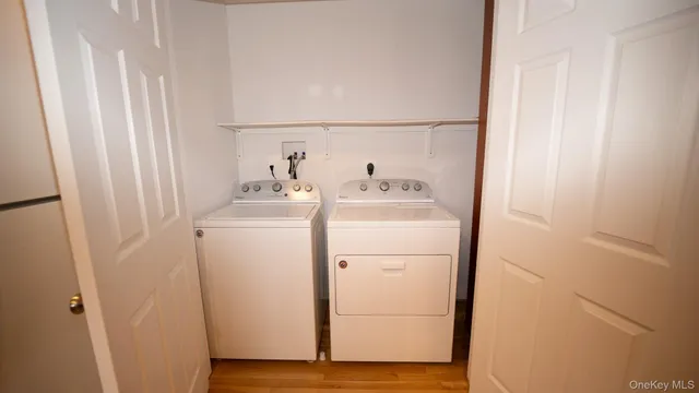 a utility room with dryer and washer
