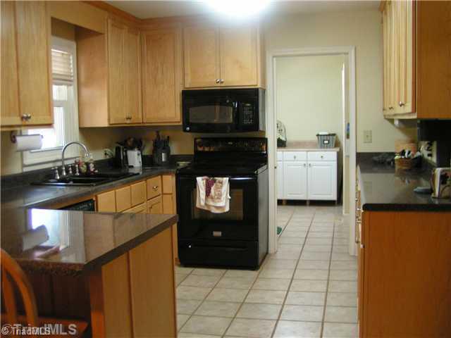 731 Brigham Road Greensboro, NC 27409 - Photo 8 of 15 Kitchen.