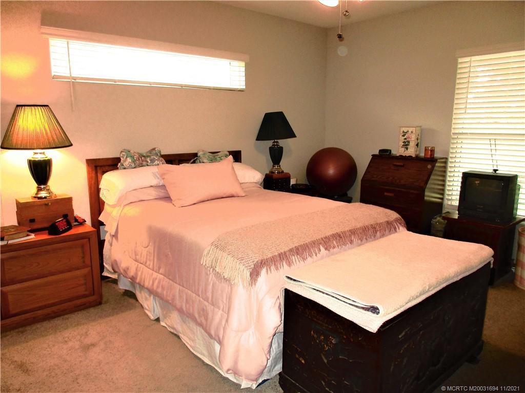 693 Southwest Jada Road Port St. Lucie, FL 34953 - Photo 11 of 18 LARGE MASTER BEDROOM FULL OF LIGHT
