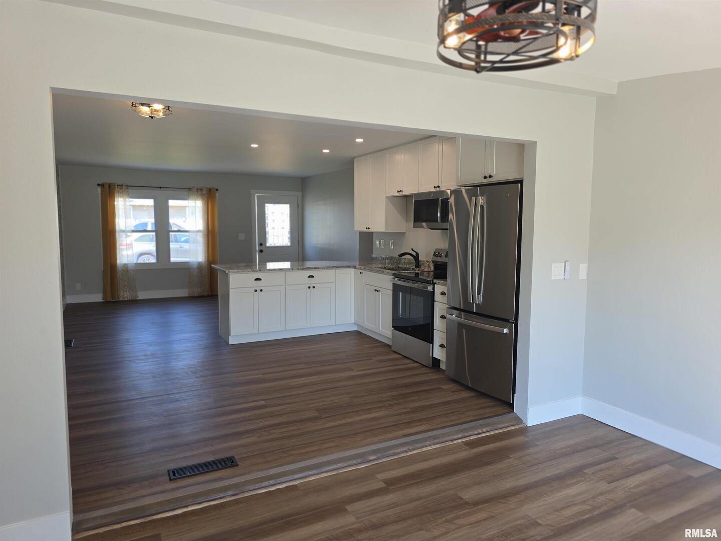 1031 Galbraith Drive Clinton, IA 52732 - Photo 15 of 35 a view of kitchen with sink and refrigerator