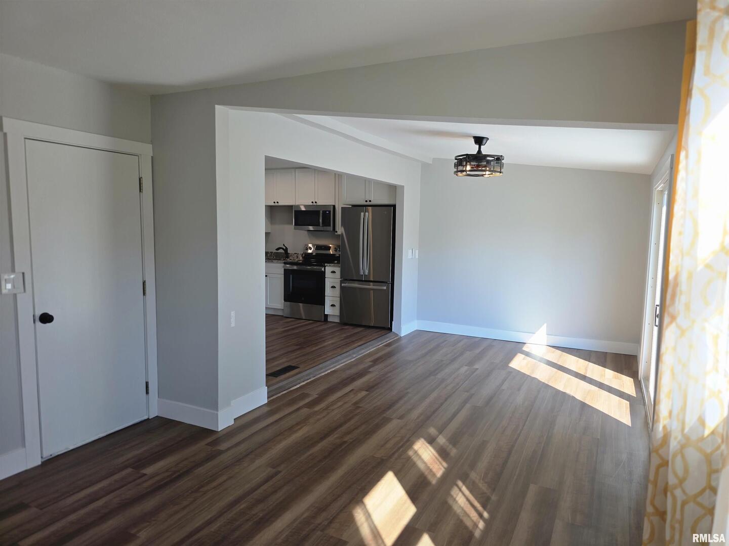 1031 Galbraith Drive Clinton, IA 52732 - Photo 20 of 35 a view of empty room with wooden floor