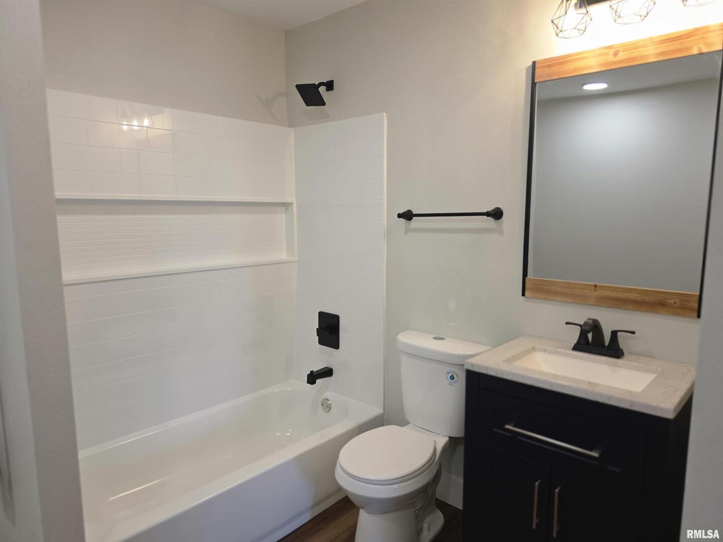 1031 Galbraith Drive Clinton, IA 52732 - Photo 28 of 35 a bathroom with a sink a toilet and shower